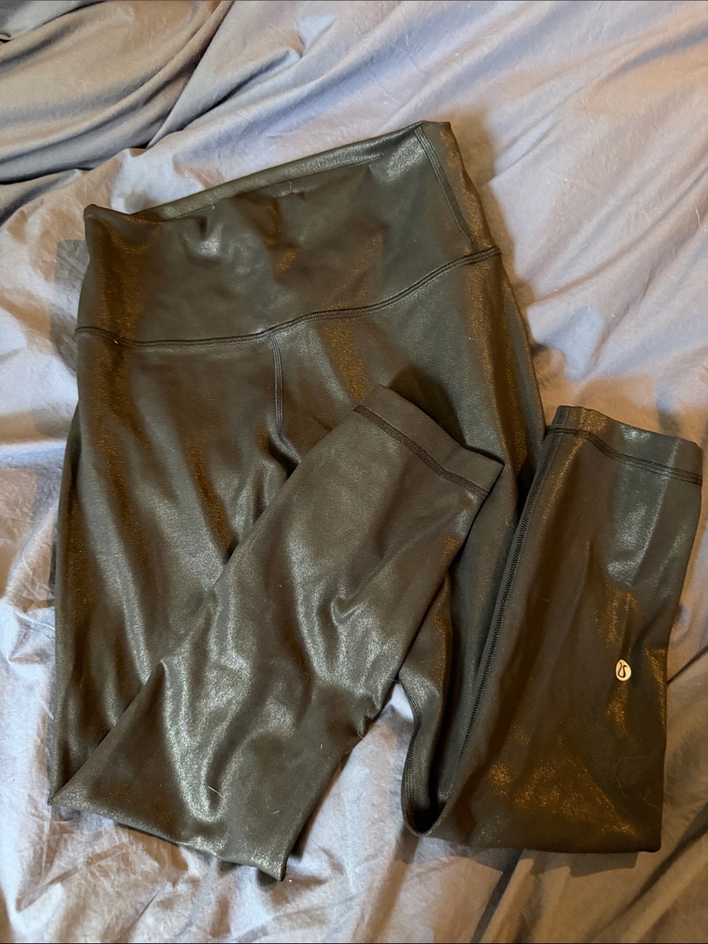 Lululemon Wundertrain black foil leggings EUC 21” inseam